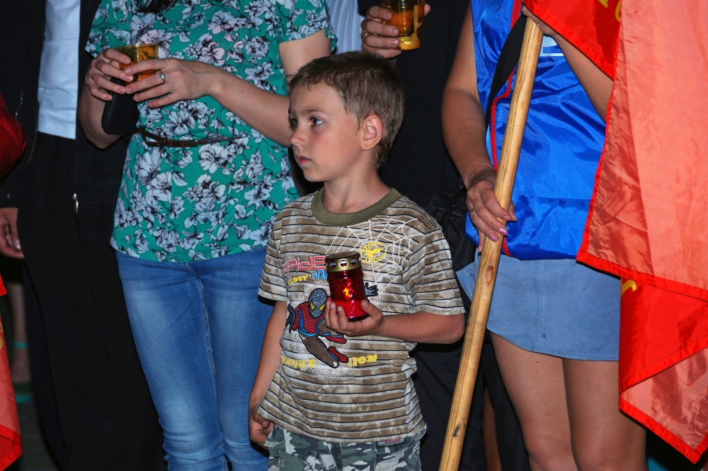 Юный участник акции